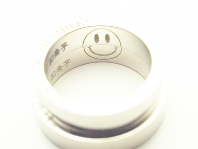 結婚指輪　ニコちゃんマーク